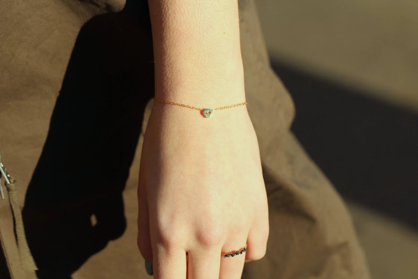 Teeny Skull Bracelet in Gold